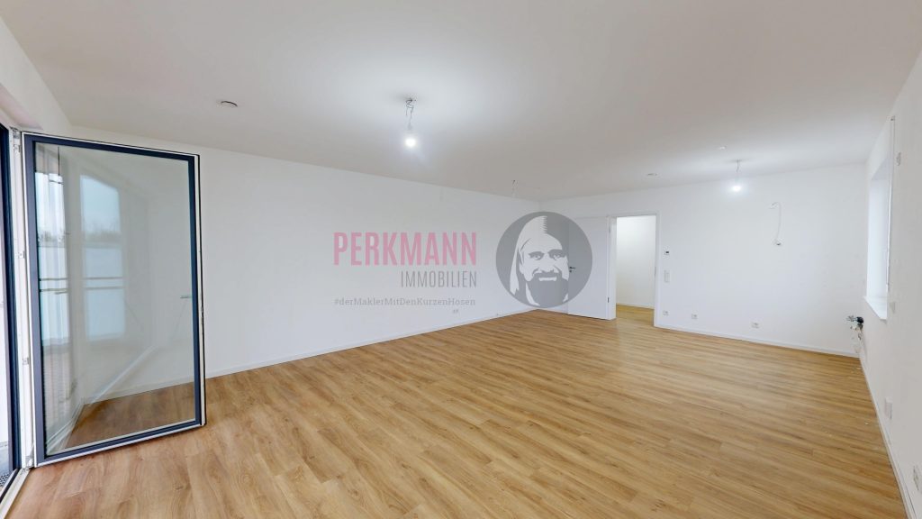 Wohnzimmer mit offener Küche