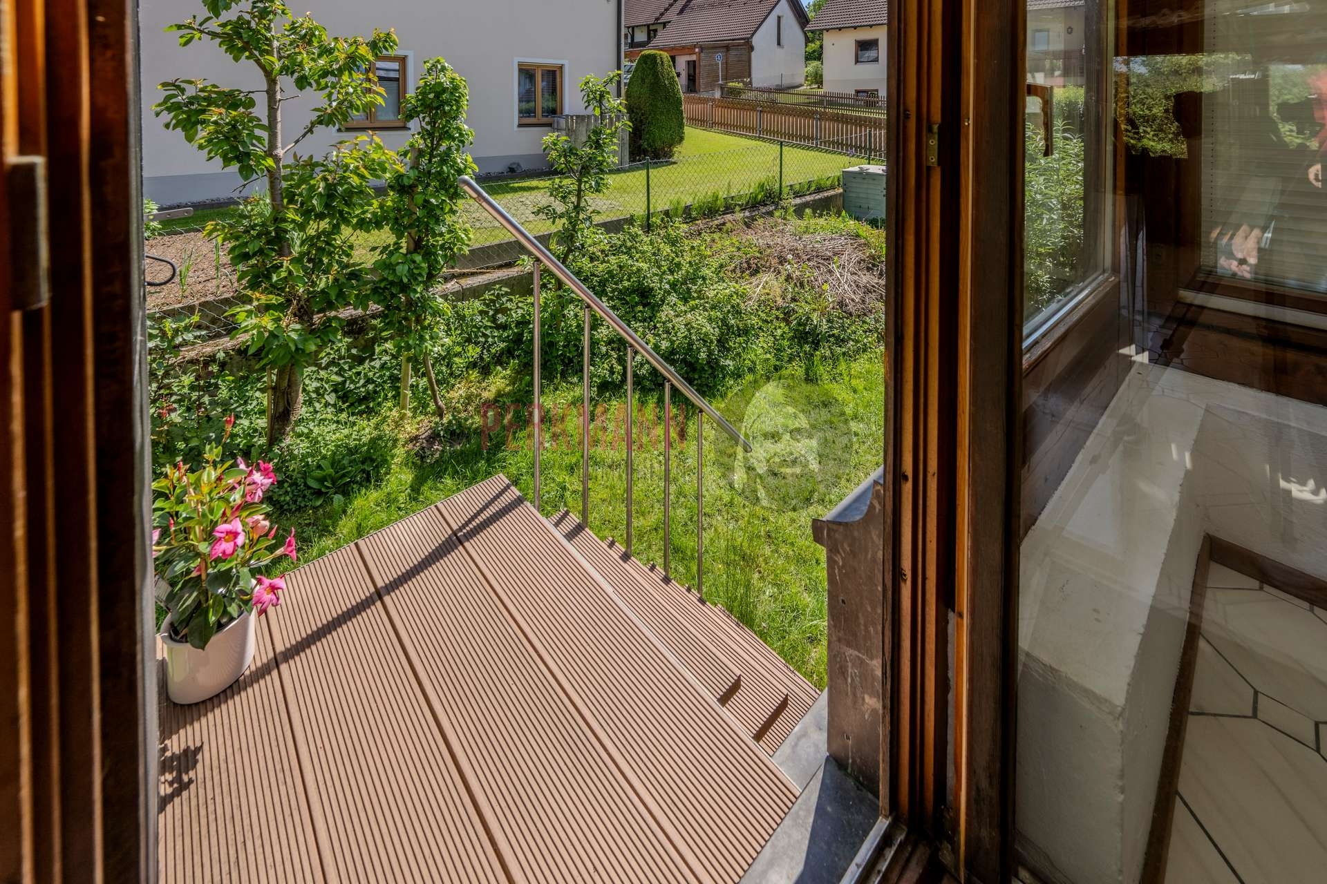 Zugang zum Garten aus dem Wintergarten