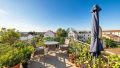 Dachterrasse begehbar vom Wohnzimmer - (KI generiert)
