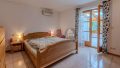 Schlafzimmer im 1. OG mit Zugang zum Wintergarten