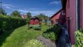 Garten vor dem Haus mit Gartenhütte